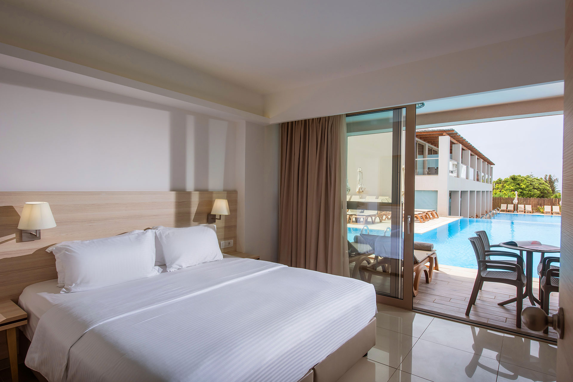 Gouves Park Family Suite Swim Up double bed, balcony view and amenities