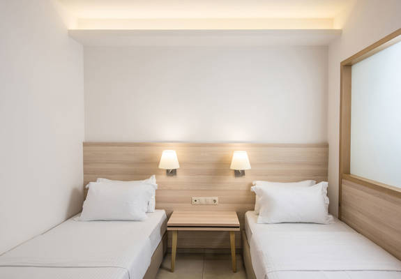 Gouves Park Family Suite two single beds with a bedside table