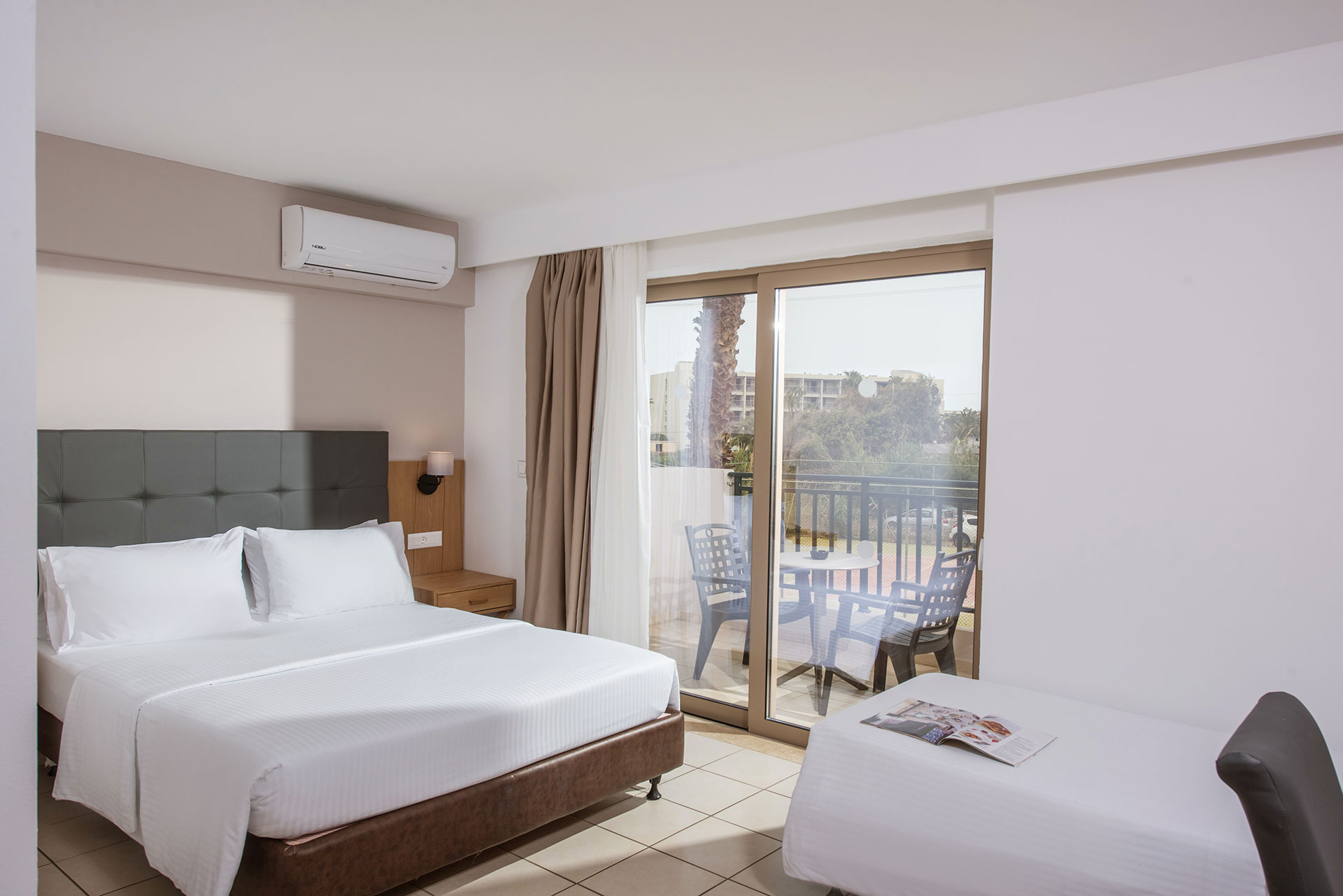 Gouves Park Family Room double bed, single bed and balcony view