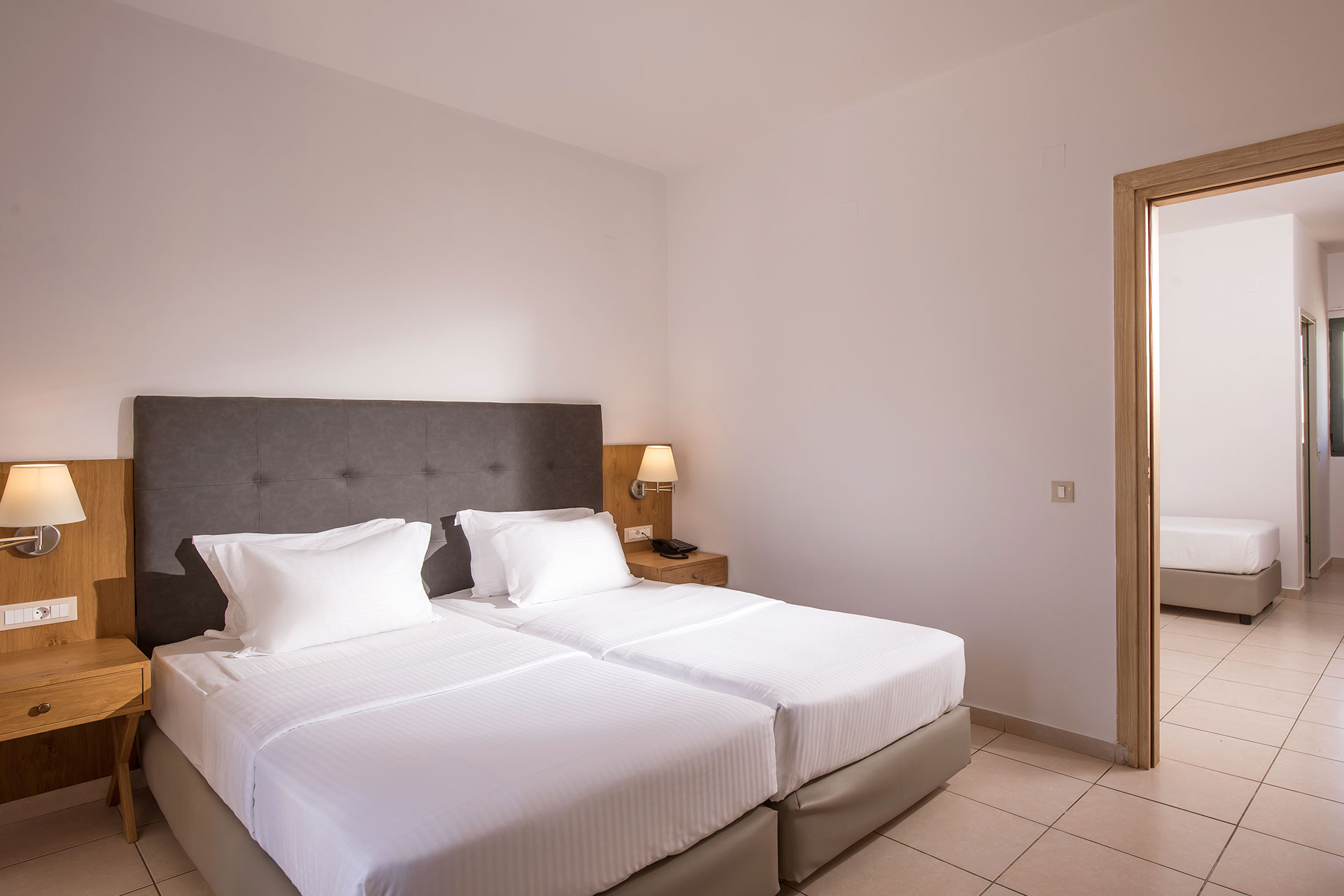 Gouves Park Family Room double bed and amenities