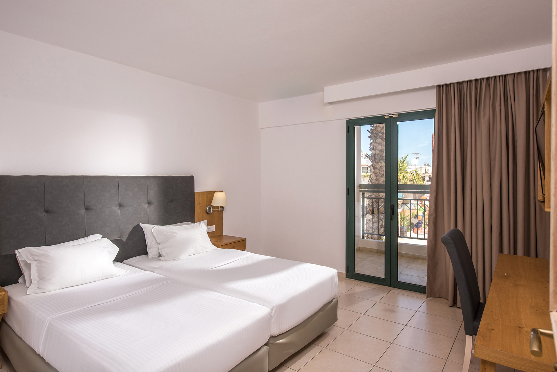 Gouves Park Family Room double bed, a big desk and amenities