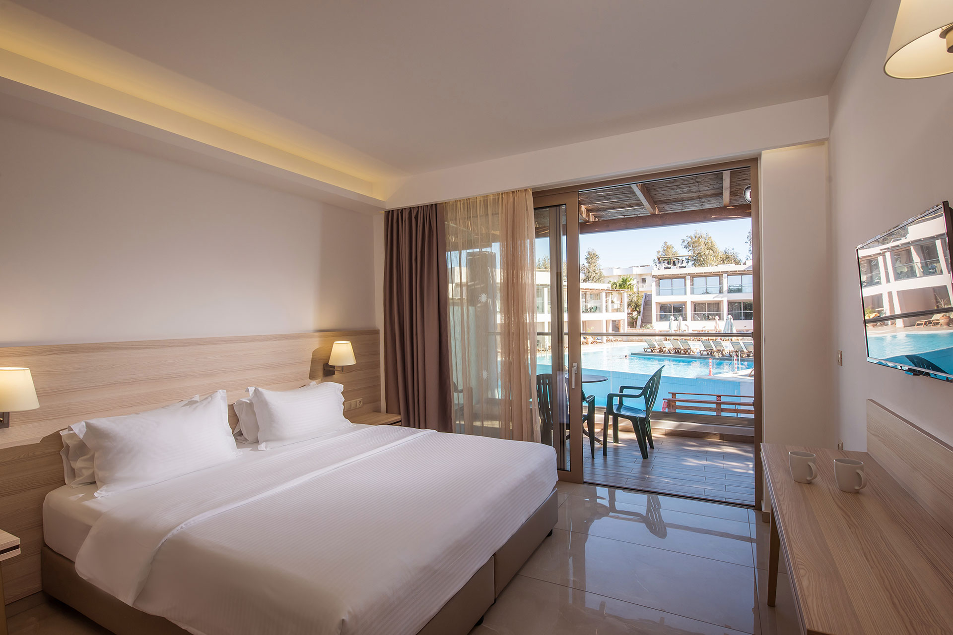 Gouves Park Family Suite Swim Up double bed, balcony view and amenities