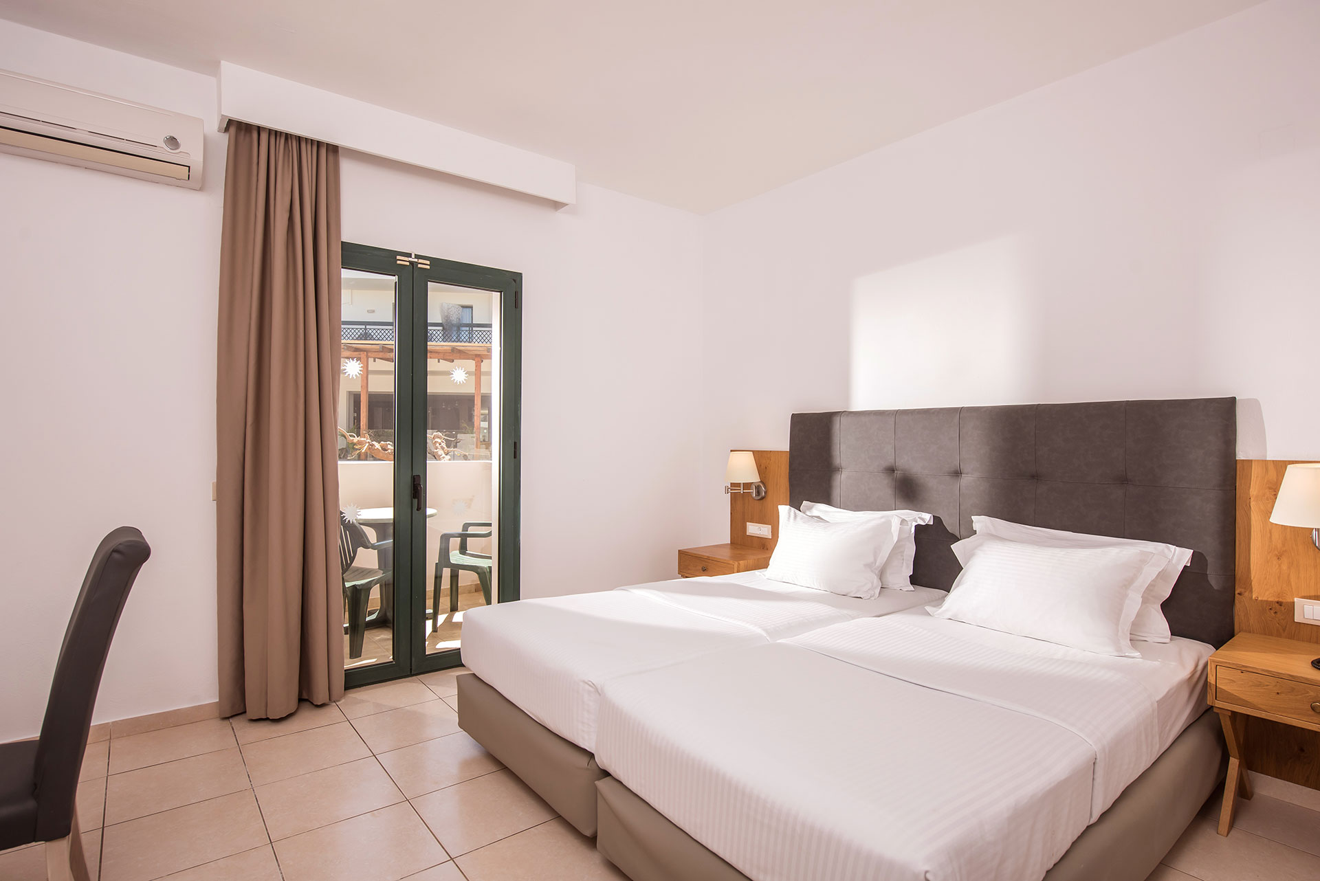 Gouves Park Family Room double bed, bedside tables and balcony view