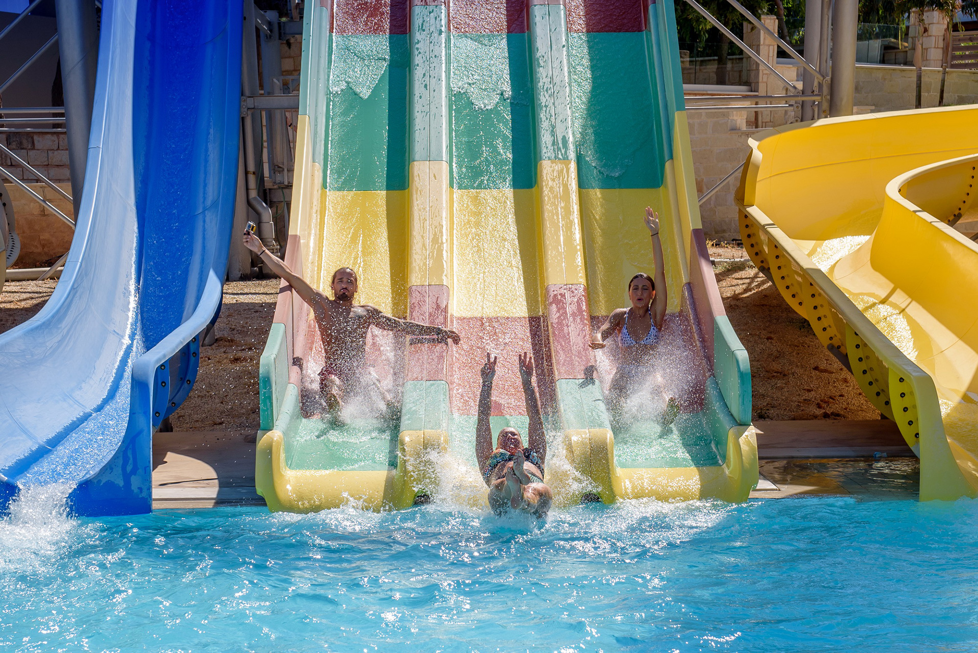 Gouves Park Slides Park visitors enjoying the slide to the pool