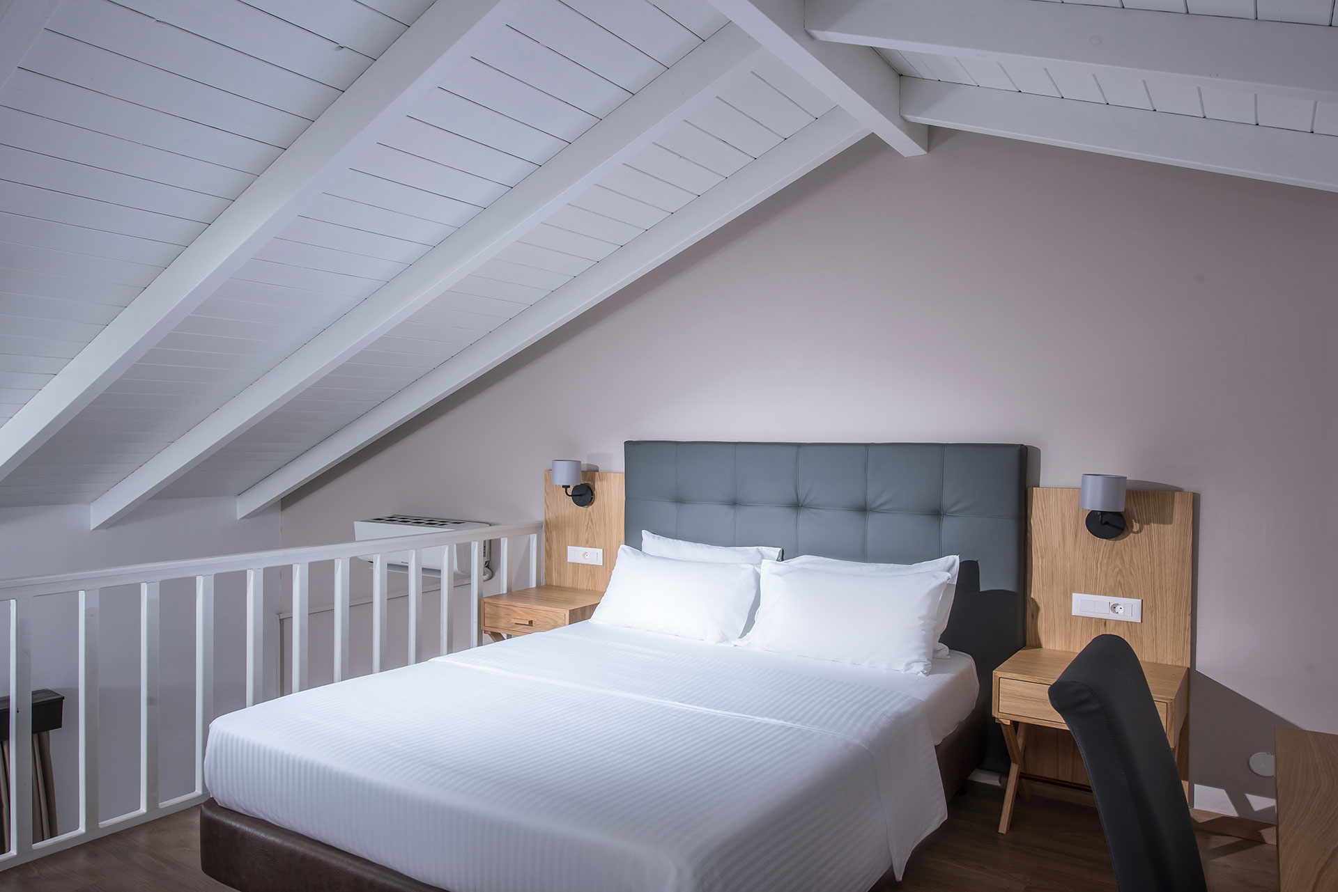 Gouves Park Maisonette Room upstairs with double bed and amenities