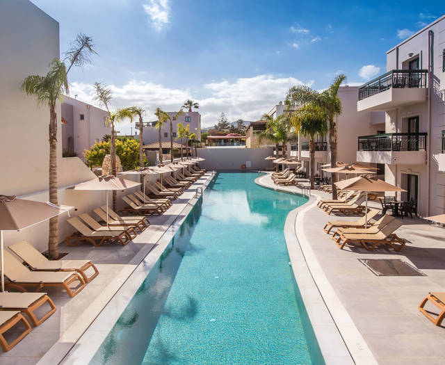 Gouves Park long pool with sunbeds and umbrellas alongside it
